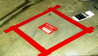 Figure 1: Hygrometer placed under the polythene sheet to record the relative humidity.
