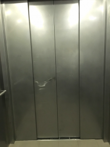 scatch-mark-on-elevator-wall